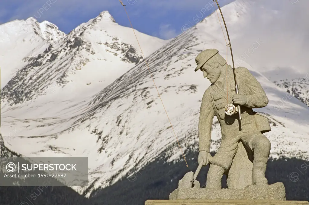 Flyfisherman statue with Hudson Bay mountain in background, Smithers, British Columbia, Canada