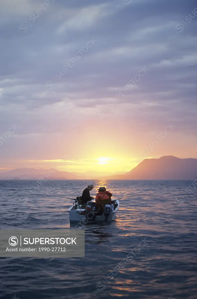 Anglers salmon fishing at sunset, Work Channel, British Columbia, Canada