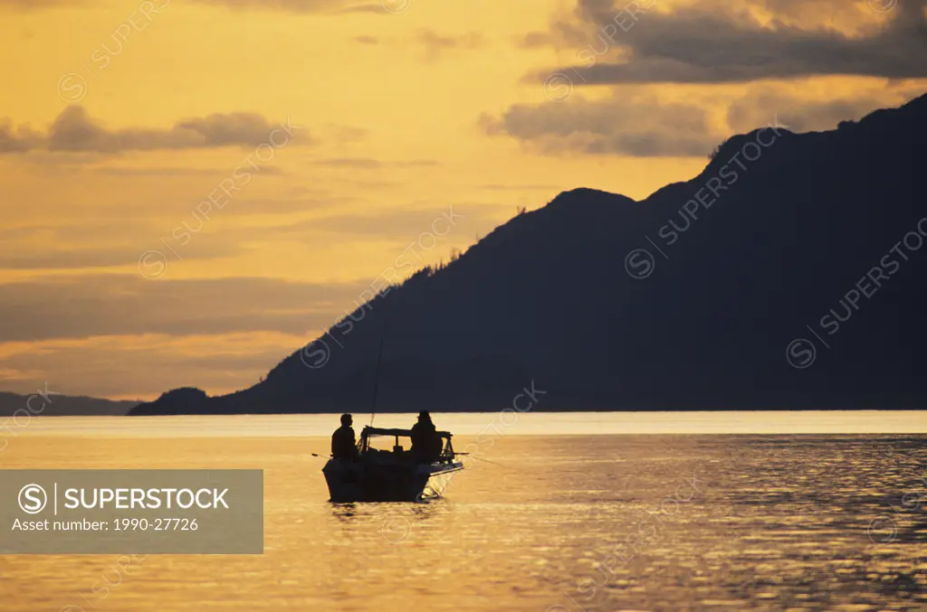 Salmon fishing boat at sunset, Knight Inlet, British Columbia, Canada