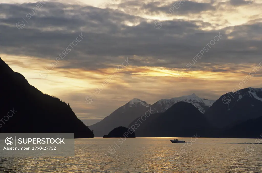 Boat at sunset, Knight Inlet, British Columbia, Canada