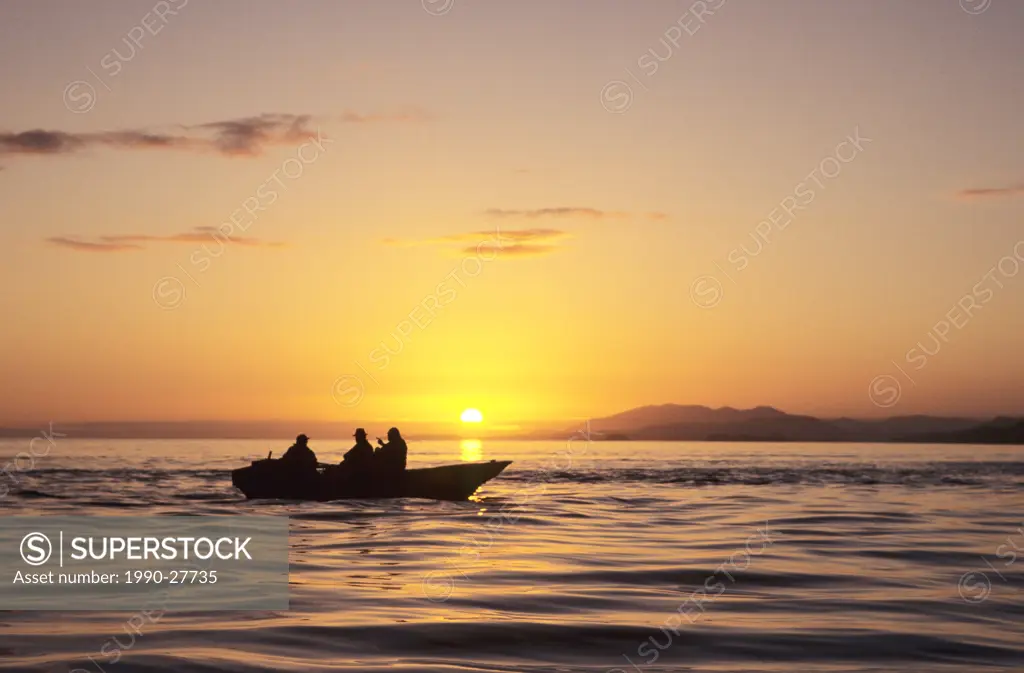 Boat salmon fishing at sunset, Work Channel, Chatham Sound, British Columbia, Canada
