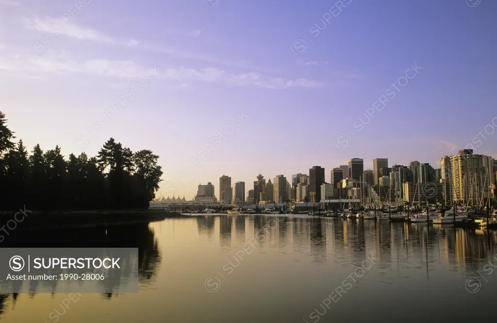Vancouver skyline and Coal Harbour from the south entrance to Stanley Park, Vancouver, British Columbia, Canada