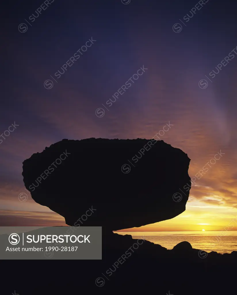 Balance Rock at sunrise near Skidegate, Haida Gwaii, British Columbia, Canada