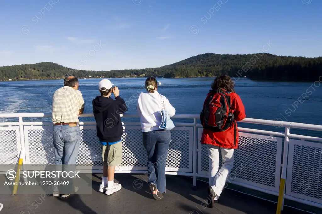 Passengers on BC Ferry in waters of Georgia Strait, British Columbia, Canada