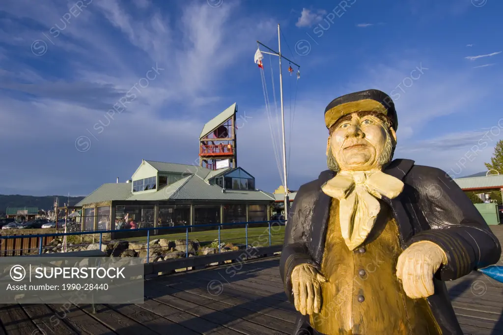 Port Alberni Quay with wood sculpture of seafarer, Vancouver Island, British Columbia, Canada