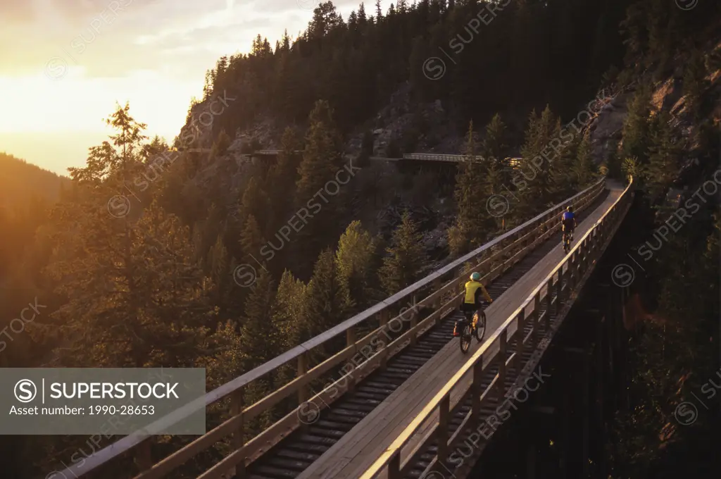 Cycling along the Kettle Valley Railway, Myra Canyon, British Columbia, Canada