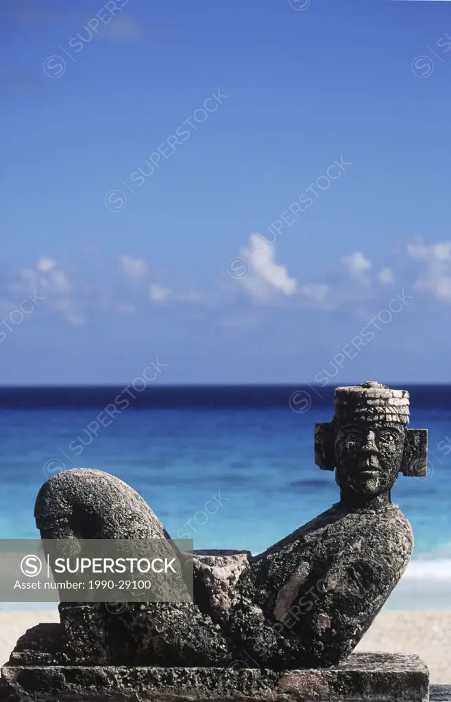 Mexico, Yucatan Peninsula, Carribean sea at Cancun with Chac_Mool figure