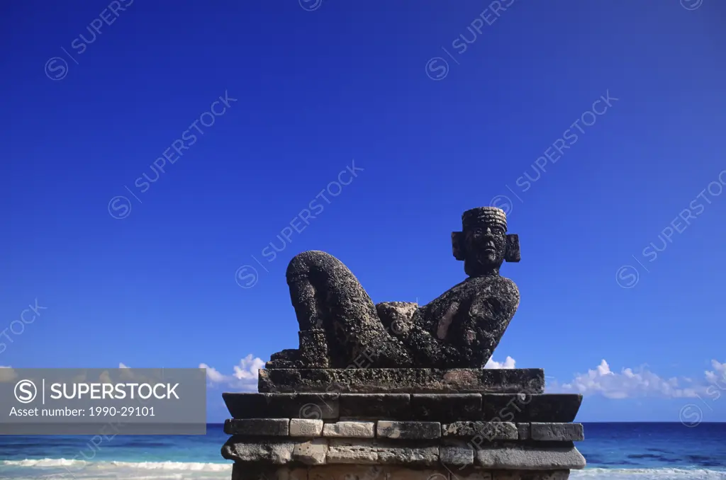 Mexico, Yucatan Peninsula, Carribean sea at Cancun with Chac_Mool figure