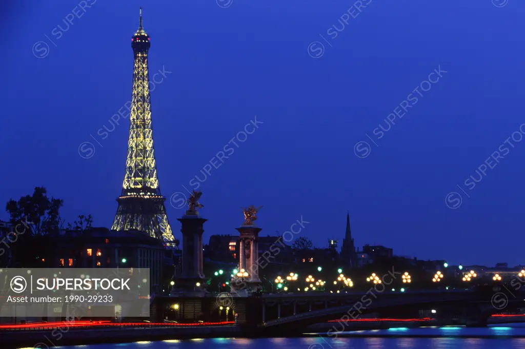 France, Paris _ Alexandre III bridge and Eiffel Tower at dusk