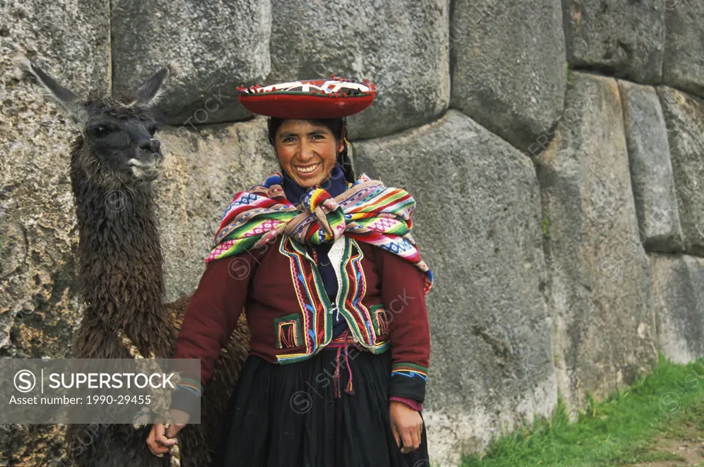 Peruvian woman with llama, Sacsayhuaman, just north of Cusco, Sacred Valley, Peru