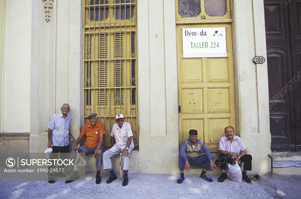 Cuba, Havana _ Barrio Chino _ local habernero men on the street.