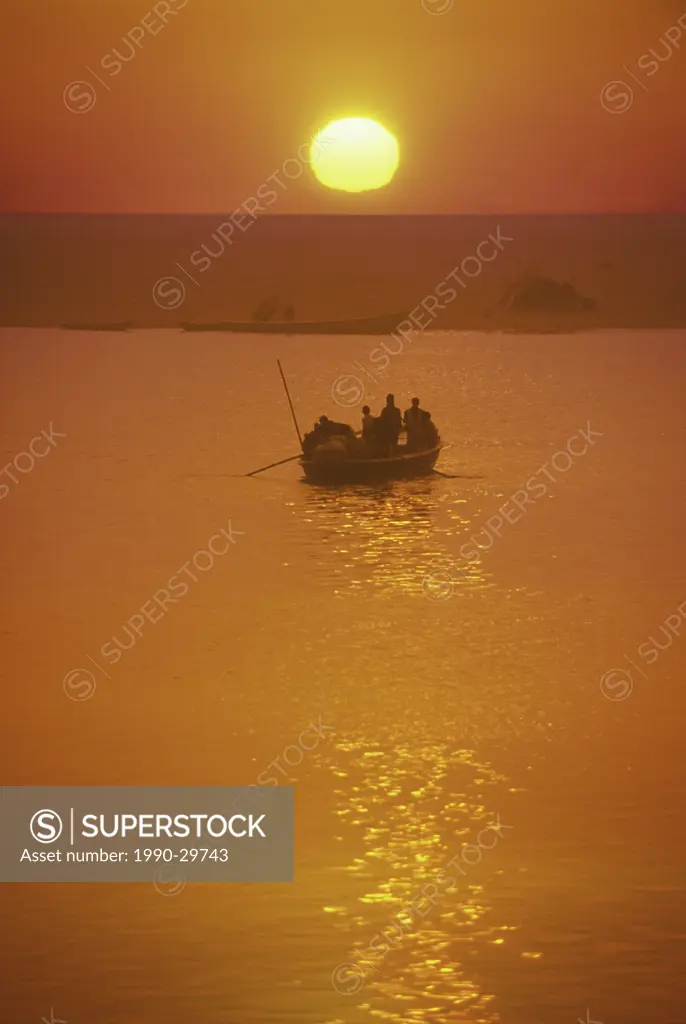 India, Varanasi, Ganges River boat load of pilgrims