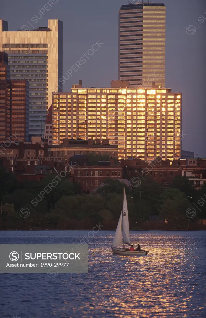 USA, Boston, Skyline across Charles River with sailboat