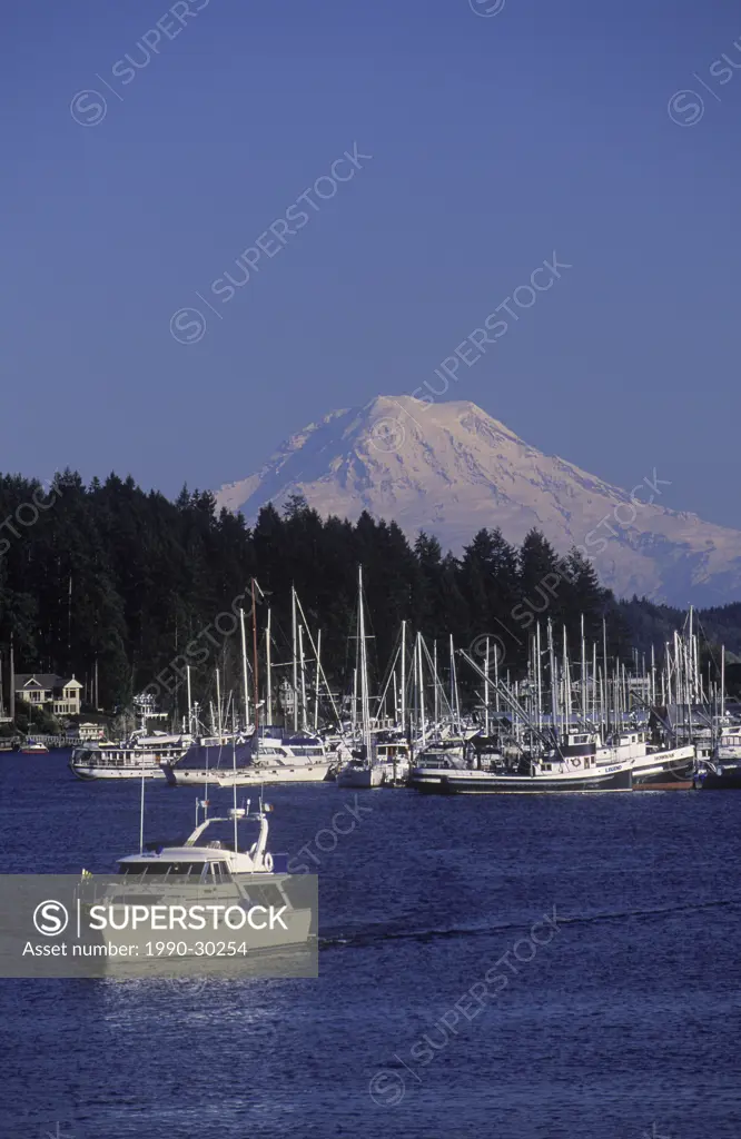 USA, Washington State, yacht in Gig Harbour with Mt. Rainier beyond