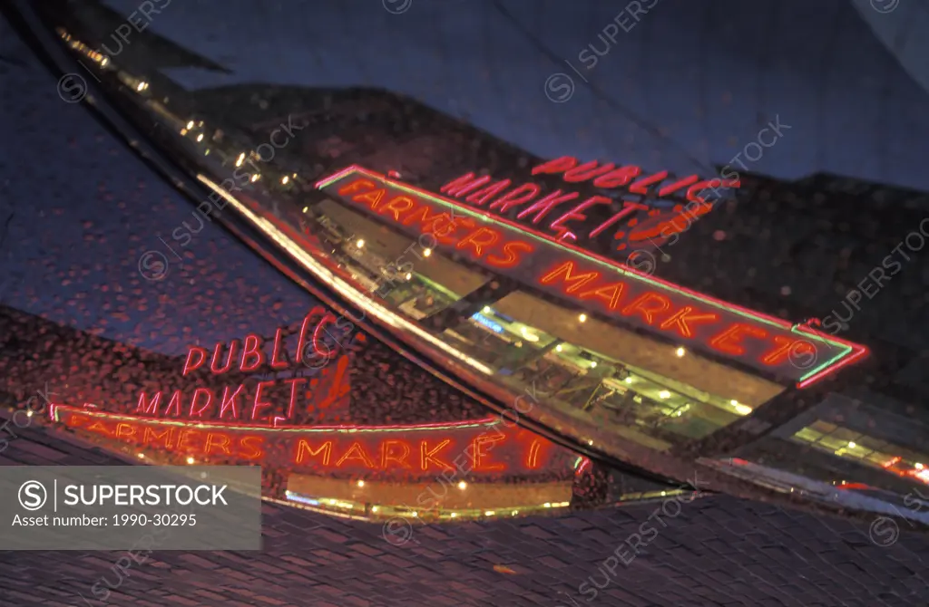 USA, Washington State, Seattle, neon sign reflected on car at Pike Place Market