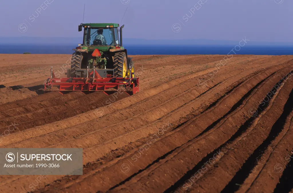 Ploughing fields in Guernsey Cove, Prince Edward Island, Canada