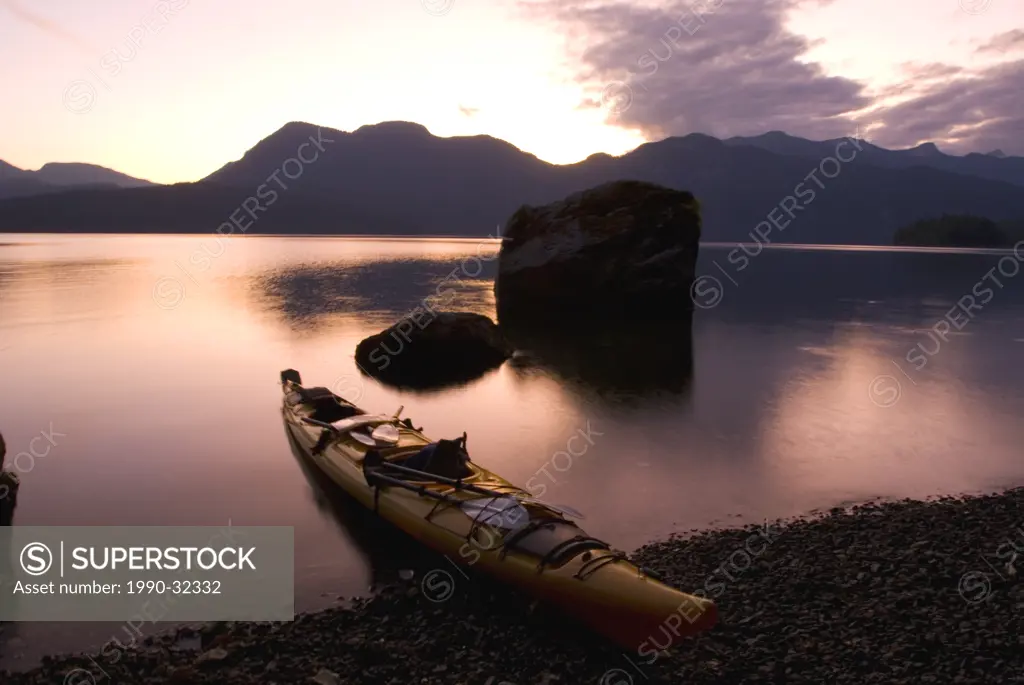 The sun sets over Hotham Sound along the British Columbia coast Canada