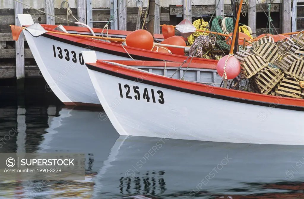 Prow of two fishing boats moored at the narrows, saint johns, newfoundland, Canada