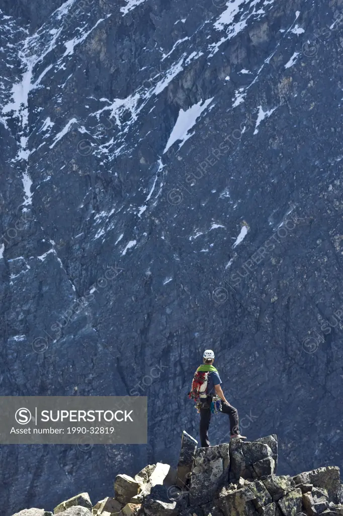 A mountain climber ascends Mt Uto in Roger´s Pass, Glacier National Park, BC