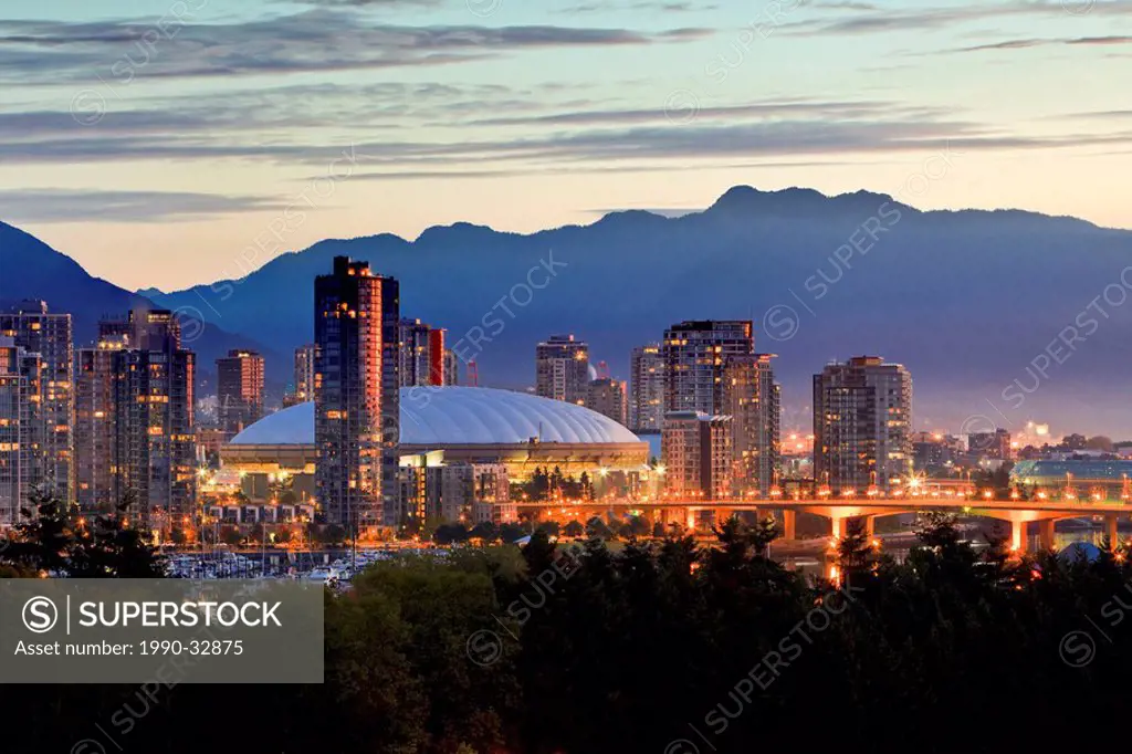 BC Place Stadium and the North Shore Mountains, venues for the 2010 Winter Olympic Games in Vancouver British Columbia Canada.