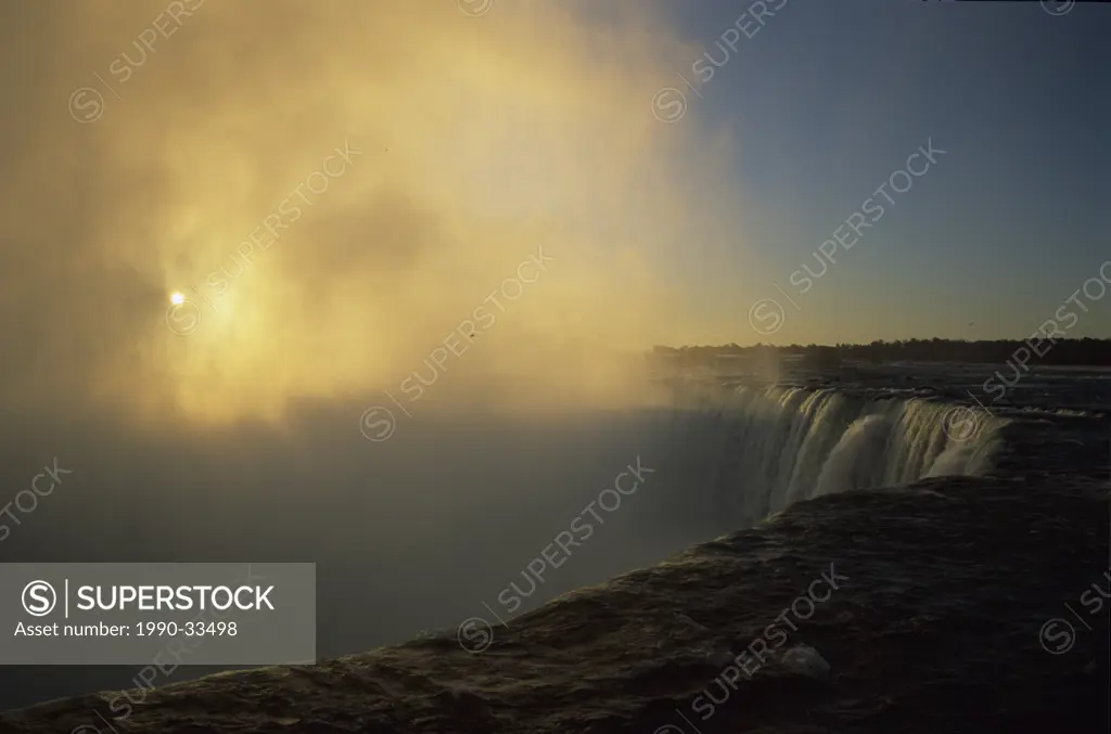 Sunrise over the mist at Niagara falls Ontario, canada