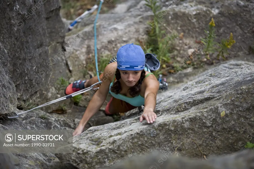 A 13 year old girl does one of first gear leads, Boa 5.3, Rattle Snake Point, ON