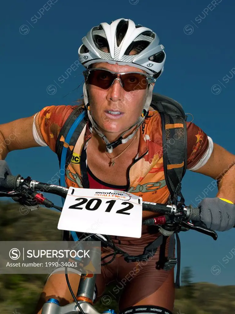 Ex_Canadian Olympian and multi_National champion Lyne Bessette races down a section of track during a mountain bike race in the Thompson Okanagan dese...