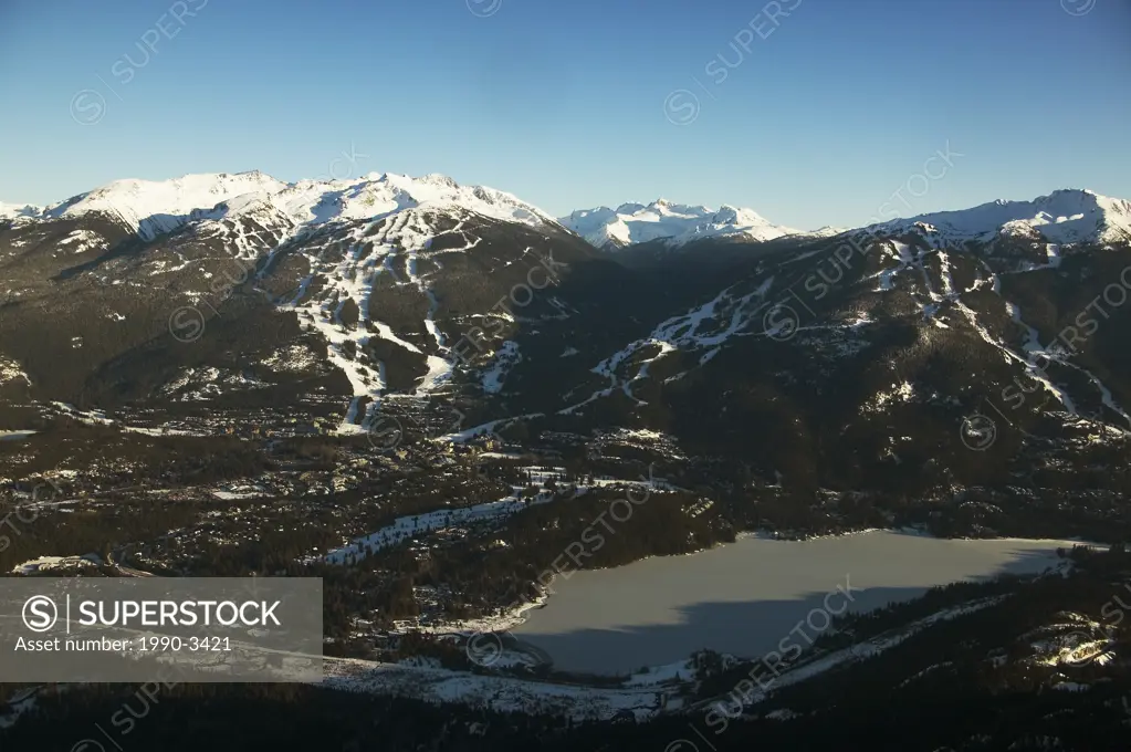 aerial of whistler village with whistler and blackcomb mountains, british columbia, Canada