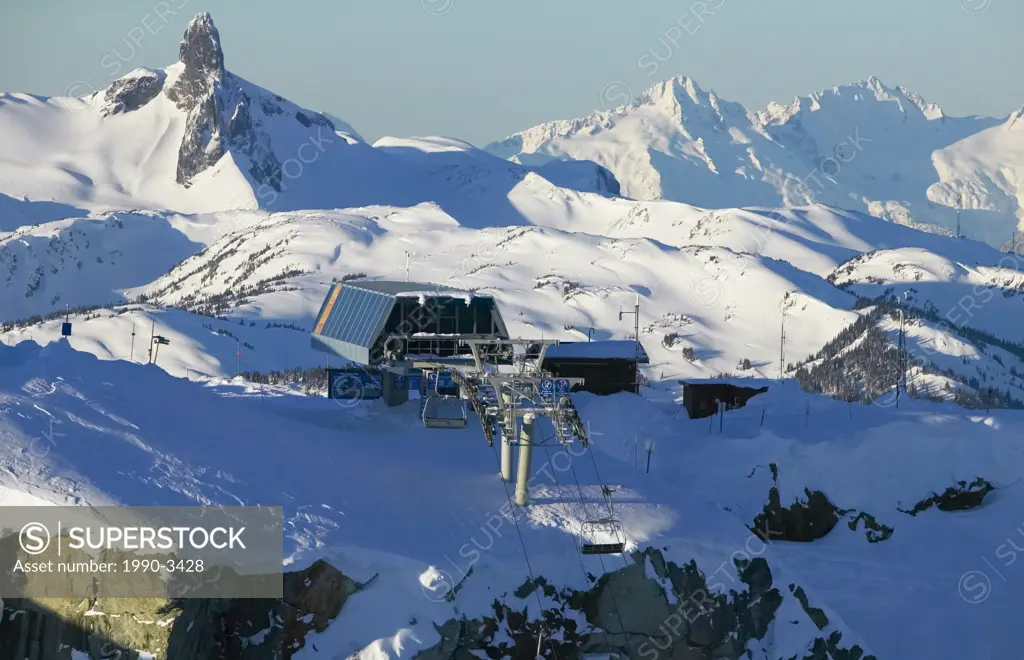 peak express chairlift, black tusk and tantalus range in background, british columbia, Canada