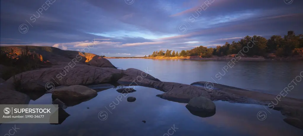 Morning light hits the granite islands in Georgian Bay in Killarney Provincial Park in Northern Ontario.