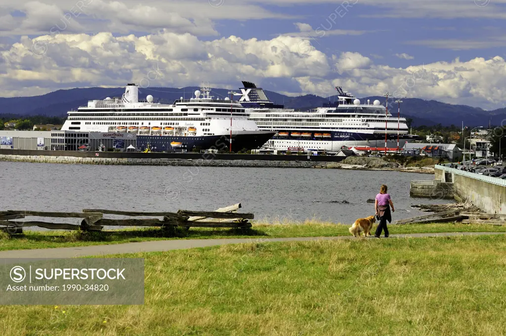 Walking along Dallas Road, with two cruise ships, Zaandam and Celebrity Mercury, at berth at Ogden Point in Victoria, British Columbia, Canada