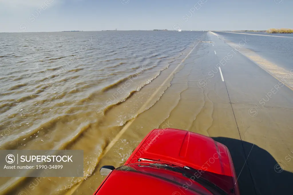 Red River flooding of Highway 75 and farmland in the Red River Valley near Morris, Manitoba, Canada
