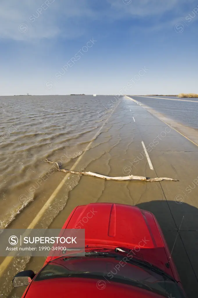 Red River flooding of Highway 75 and farmland in the Red River Valley near Morris, Manitoba, Canada