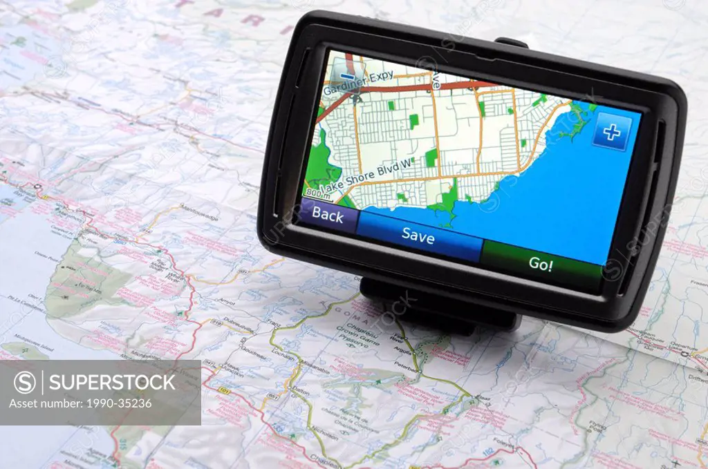 Automotive GPS device Garmin Nuvi 880 on a road map