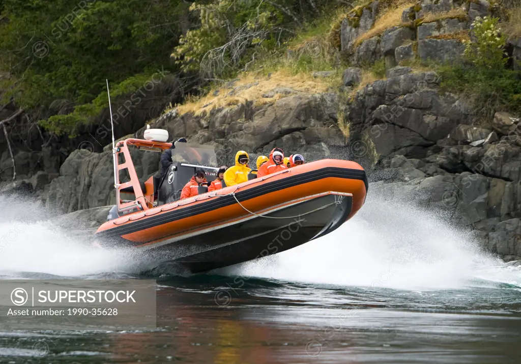 Guests on a Zodiak tour of Arran Rapids are treated to the biggest tides of the year, Discovery Islands, Central British Columbia, Canada.