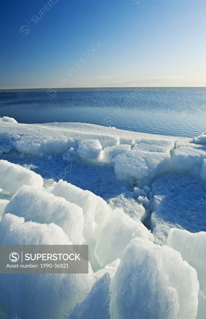 washed up ice flows along Lake Winnipeg, Manitoba, Canada