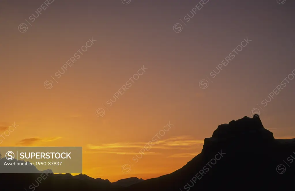 Castle Mountain silhouetted at sunset, Bow Valley, Banff National Park in the Canadian Rockies