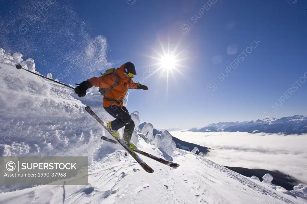 Young man telemark_skiing at Revelstoke Mountain Resort, BC, Canada. model release 08113