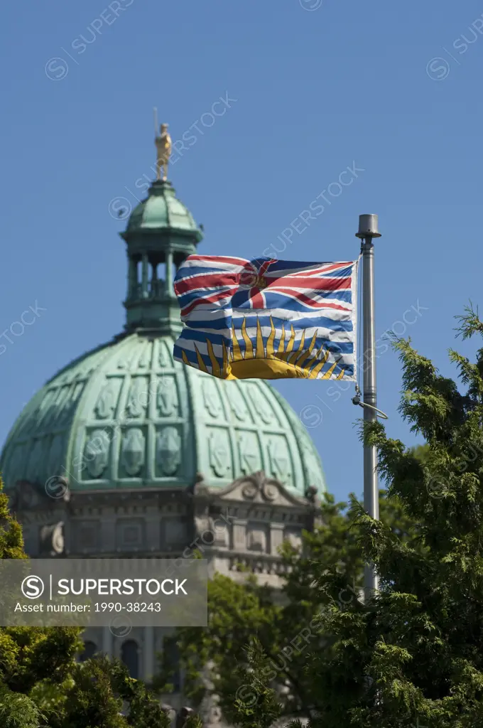 Flag of British Columbia and dome of BC Legislature, Victoria, BC, Canada