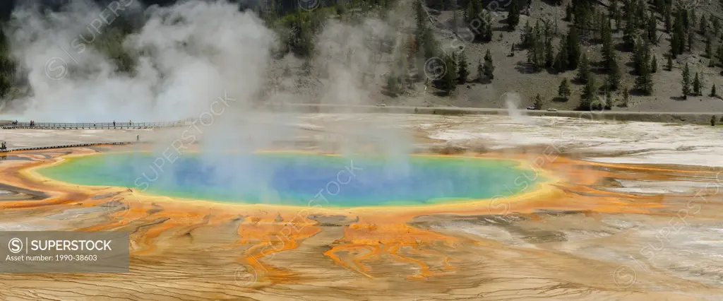 Visitors and boardwalks at Grand Prismatic Spring. Yellowstone National Park, Wyoming, United States of America.