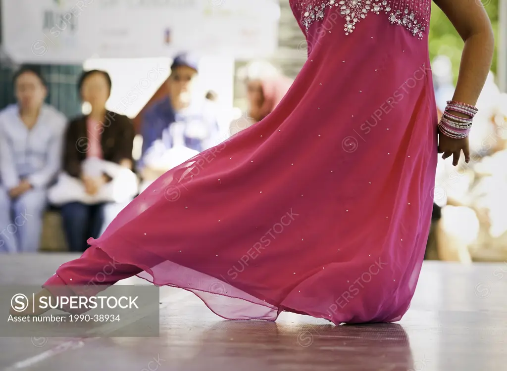 East Indian Bollywood inspired dancer. The Forks, Winnipeg, Manitoba, Canada.