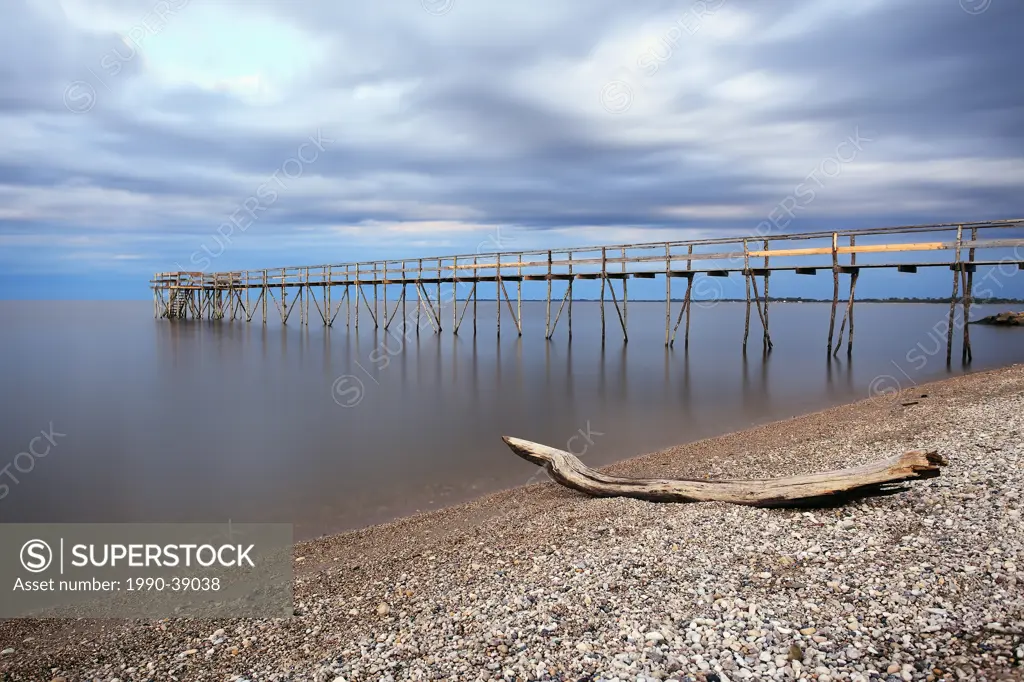 Wooden Pier on Lake Winnipeg and Matlock Beach. Matlock, Manitoba, Canada.