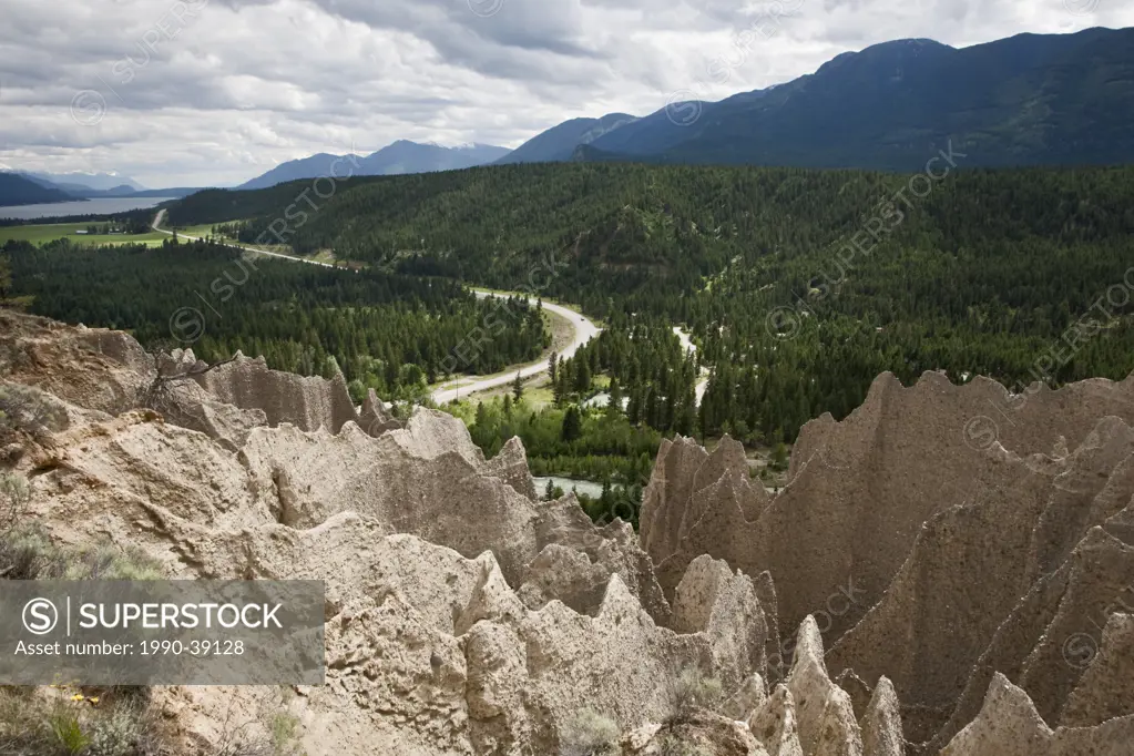 The Dutch Creek Hoodoos with highway 93 and Columbia Lake in the background, East Kootenay, British Columbia, Canada.