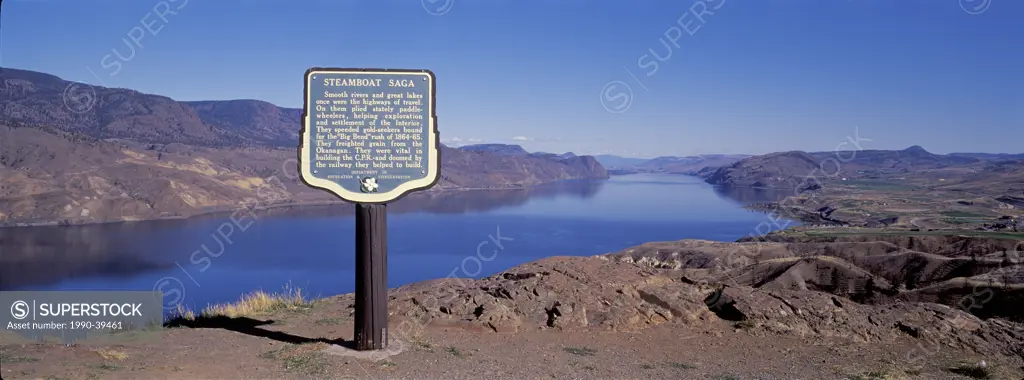 Kamloops Lake on Thompson River with Gold rush/ Steamboat Saga sign, view towards Kamloops from the roadsite on Highway 1 close to Savona, British Col...