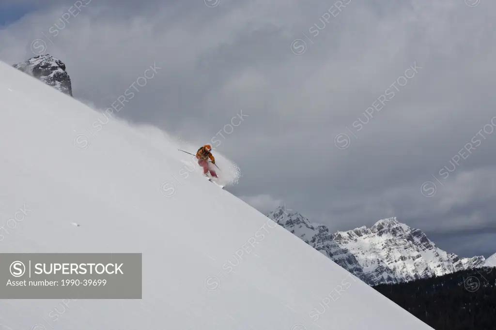 A backcountry skier skiing, Mount Assiniboine, Mount Assiniboine Provincial Park, British Columbia, Canada