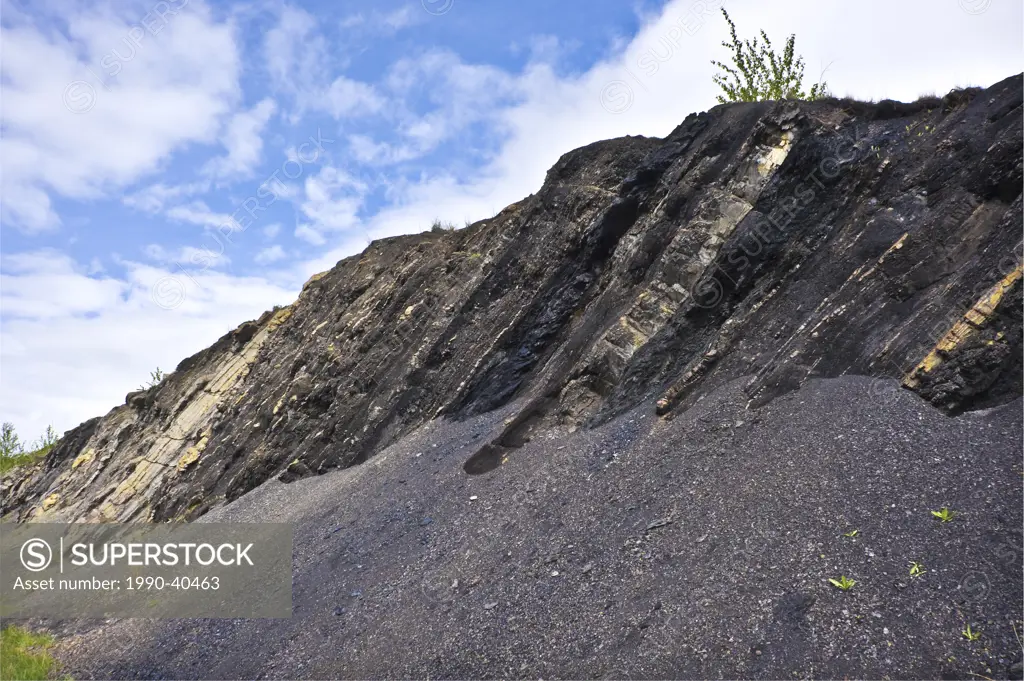 Naturally formed coal seams protruding from the earth at Grand Cache, Alberta, Canada.