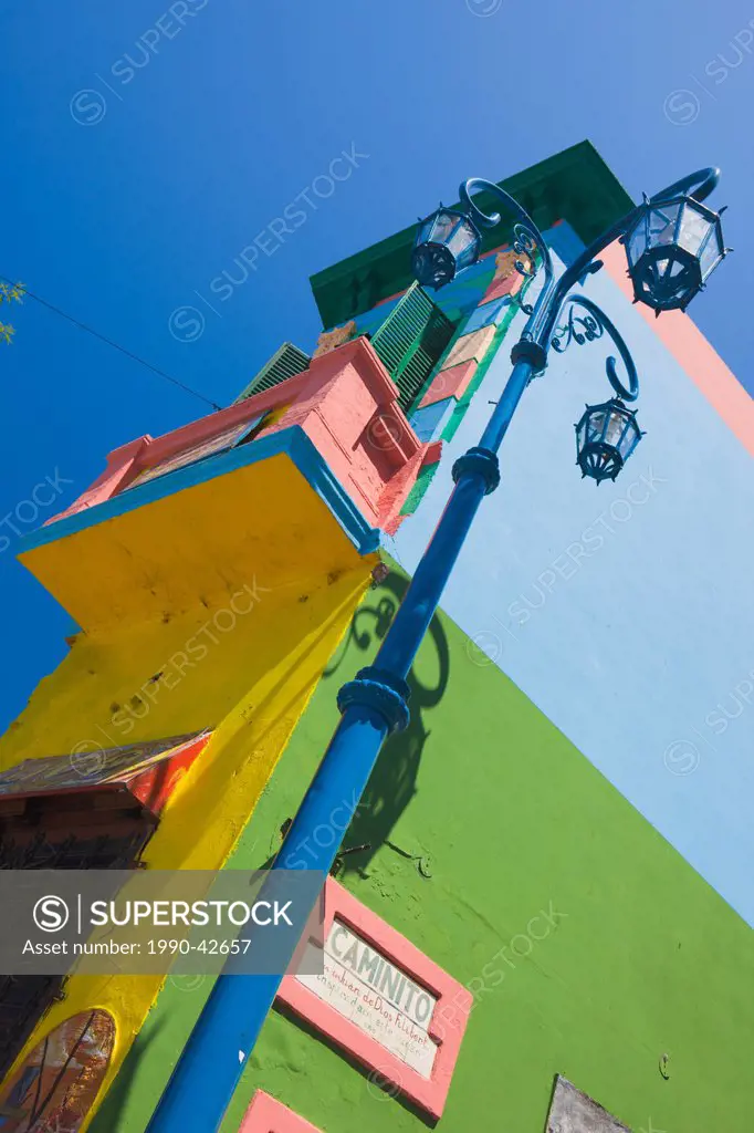 Colourful building and lamppost along Caminito Street in La Boca district in Buenos Aires, Argentina.