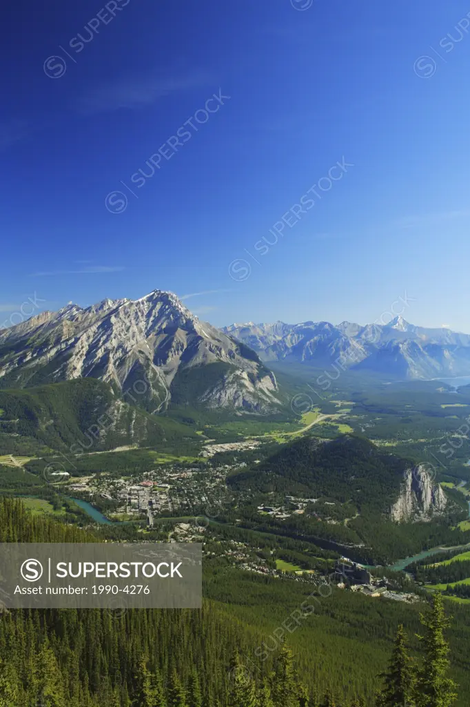 Aerial view from the top of Sulphur Mountain of the Town of Banff and Cascade Mountain, part of the Banff-Jasper World Heritage Site, Banff National P...