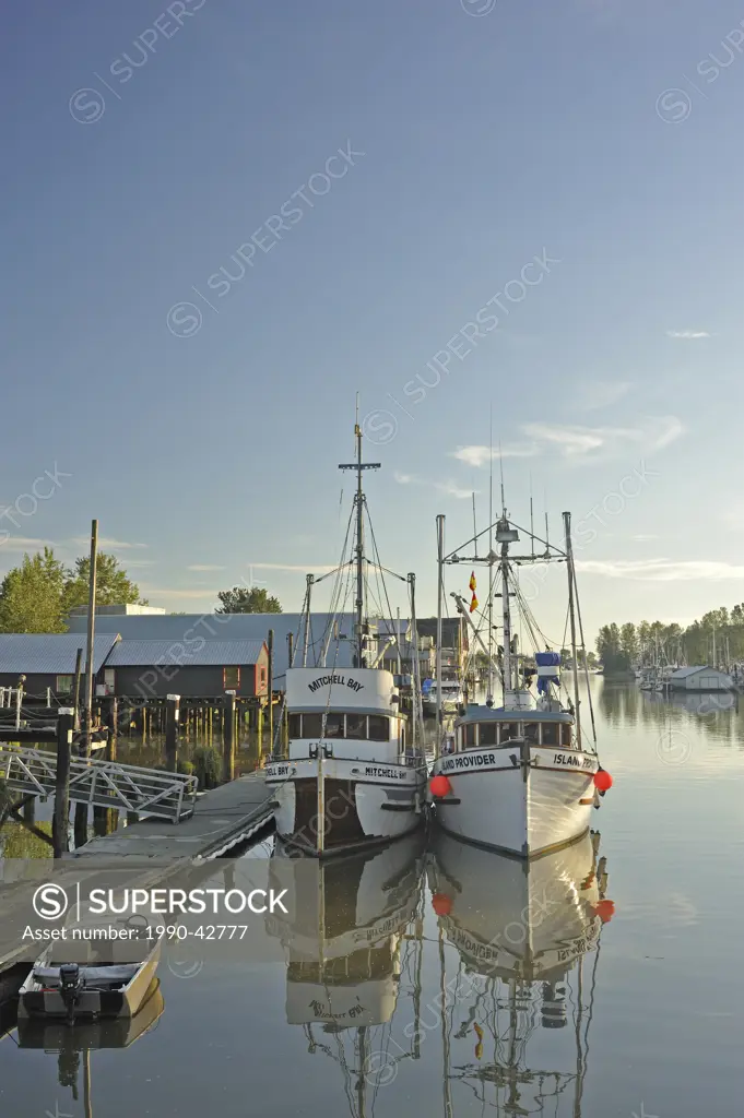 fishing boats moored in Fraser river at Ladner, South Delta, British Columbia, Canada