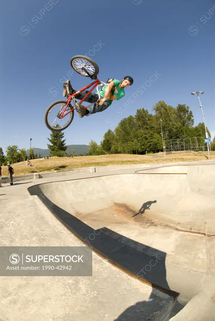 BMXer with an X_up air at Lafarge Skatepark, Coquitlam, BC Canada.